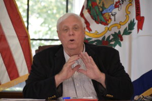 Justice would like to see 12,000 per day get tested; it would cost $1.2 million per day